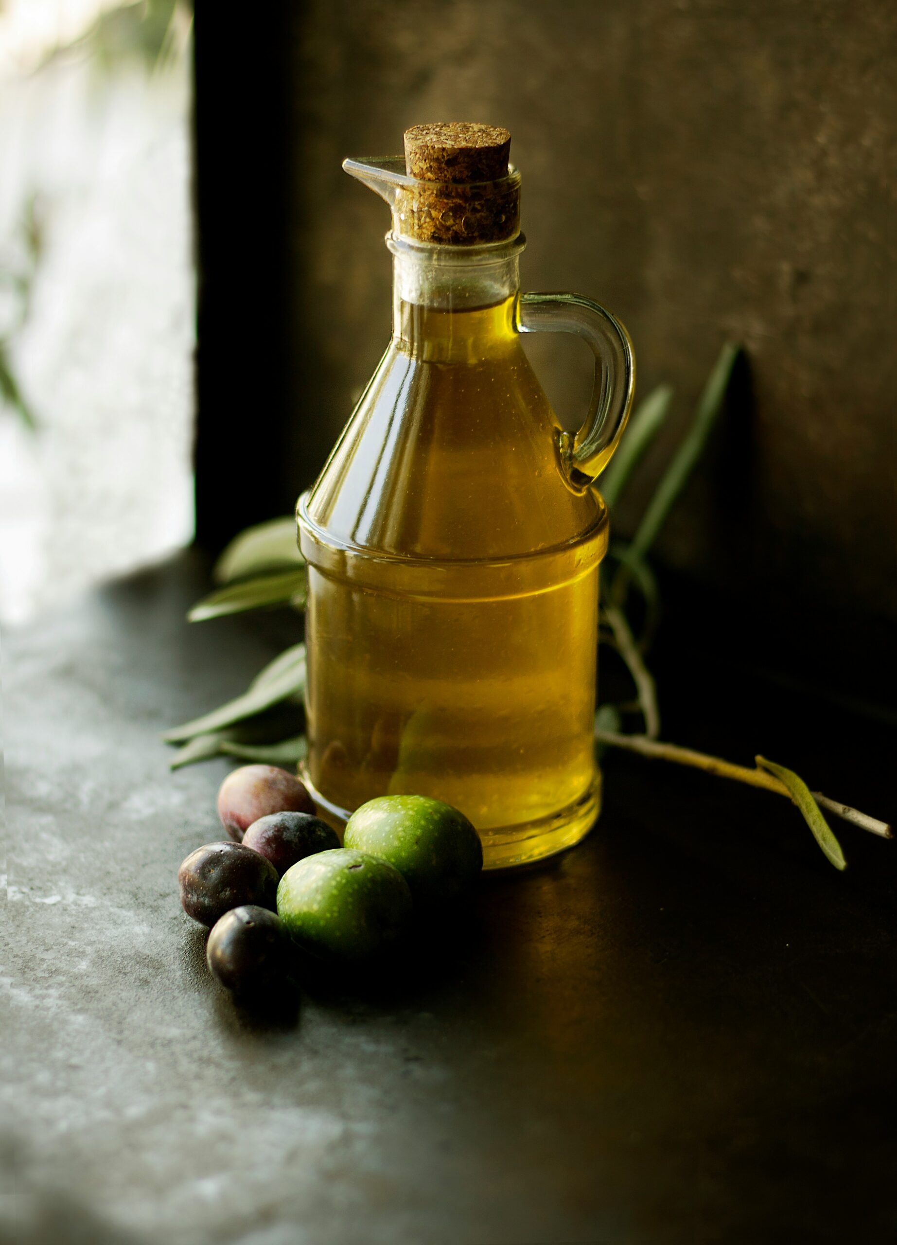 Golden oil pouring from a spout